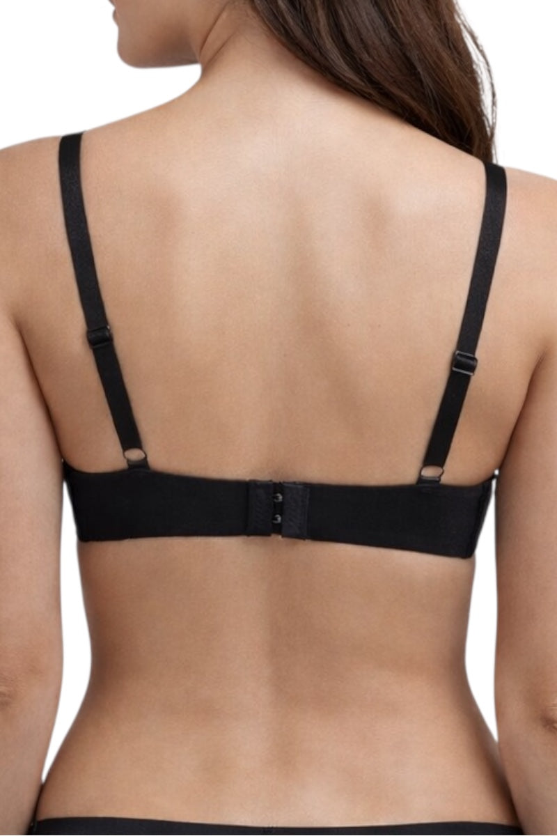 Black bra worn by a model on a white background