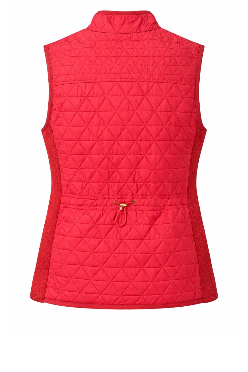 Red quilted vest on a white background