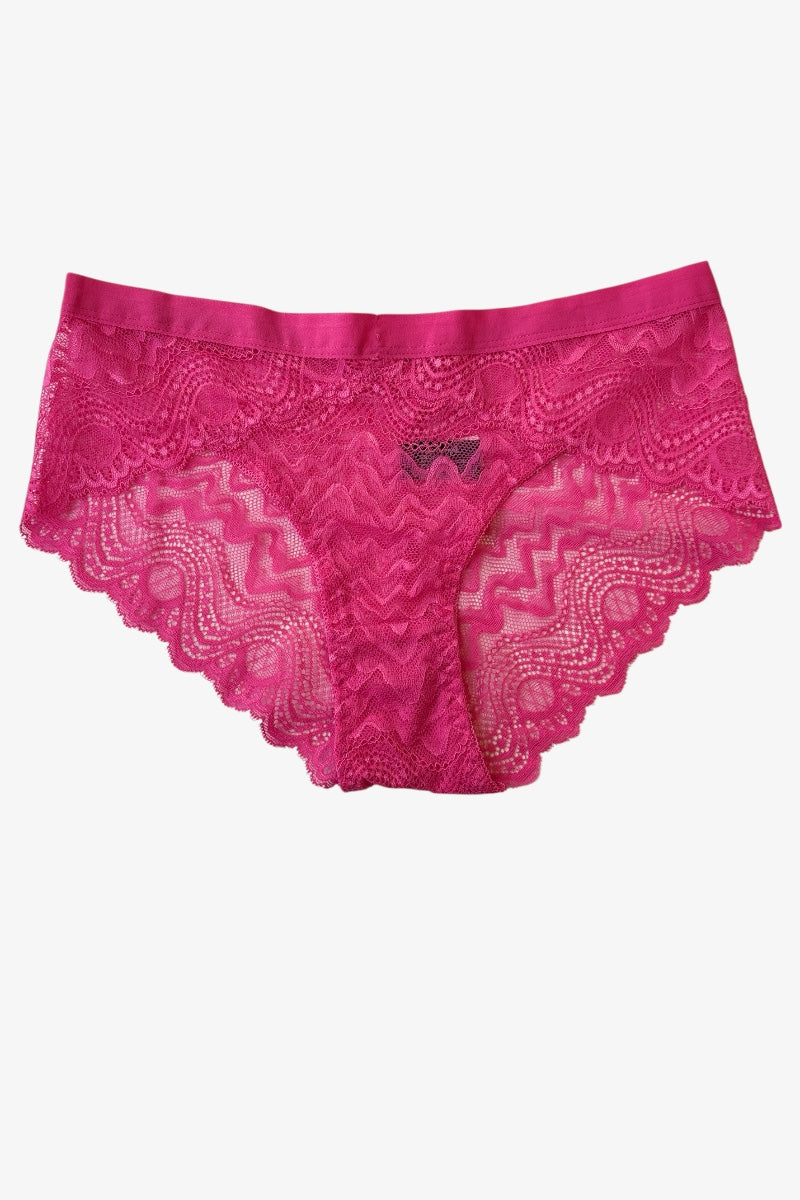Pink lace underwear on a white background