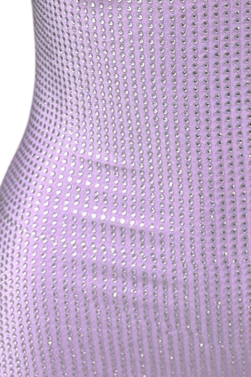 Close-up of a rhinestone lavender fabric with a subtle pattern.