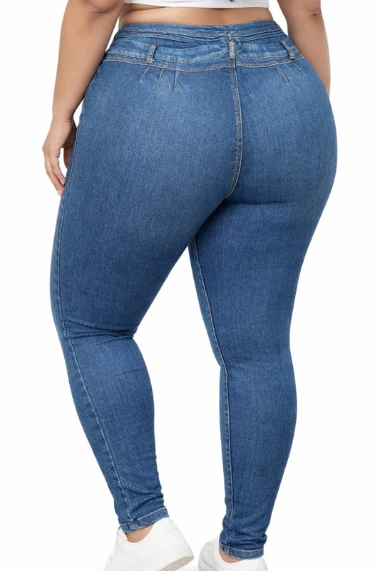 Blue jeans worn by a person on a white background