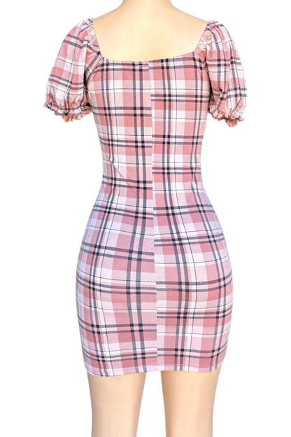 Plaid dress with puff sleeves on a white background