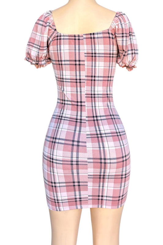 Plaid dress with puff sleeves on a white background