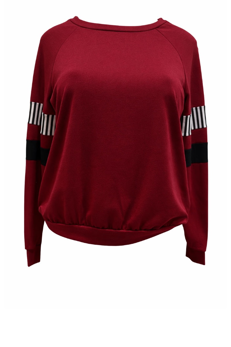 Burgundy sweater with black and white striped sleeves on a white background