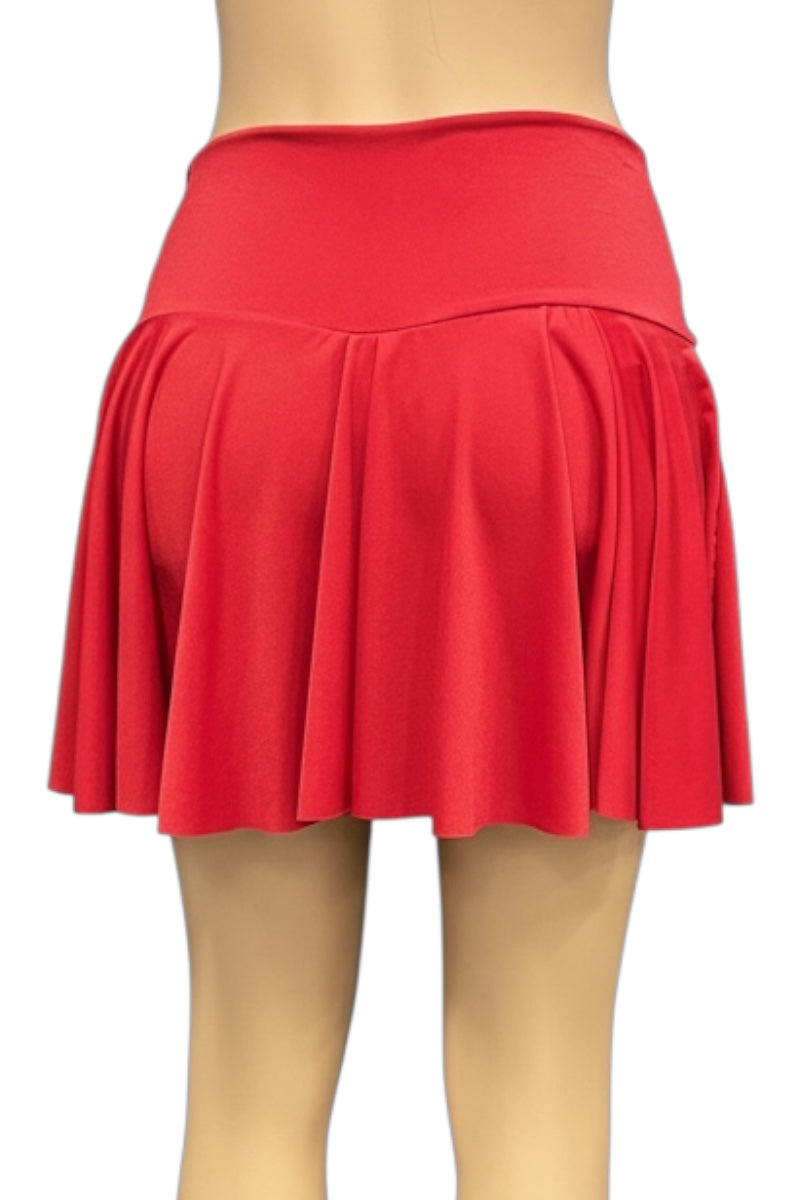 Red skirt worn by a mannequin on a white background
