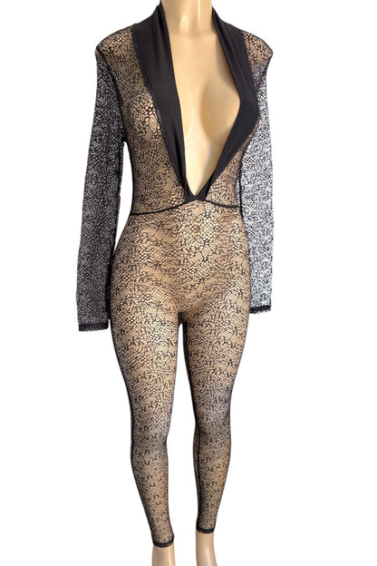 Mannequin wearing a black lace jumpsuit on a white background