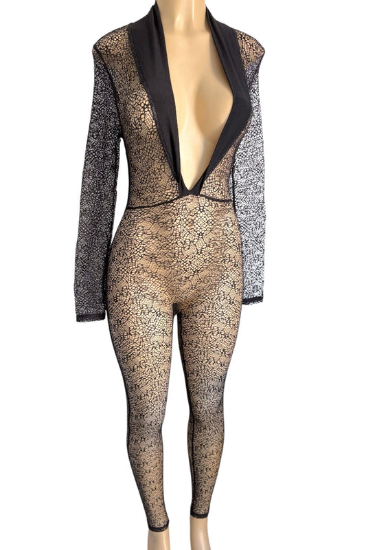 Mannequin wearing a black lace jumpsuit on a white background