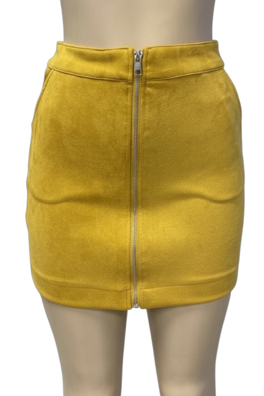Mustard Yellow suede skirt with a zipper on a mannequin against a white background