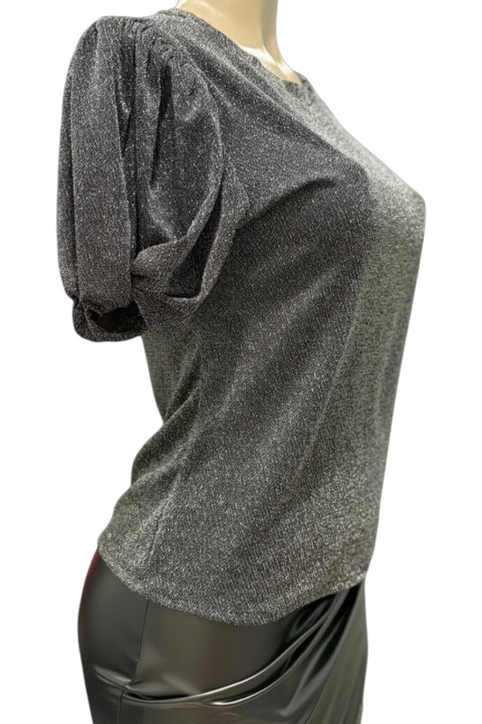 Silver glittery top on a mannequin against a white background