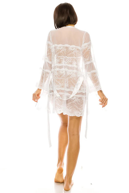 White lace robe worn by a person on a white background