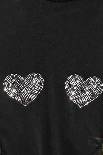 Black top with heart-shaped rhinestone embellishments on a plain background