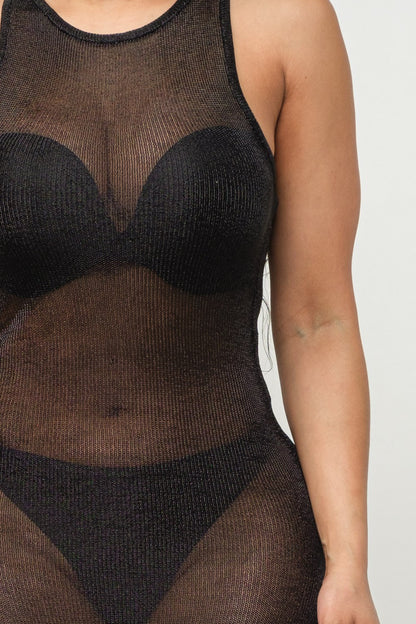 Black sheer mesh dress on a plain background