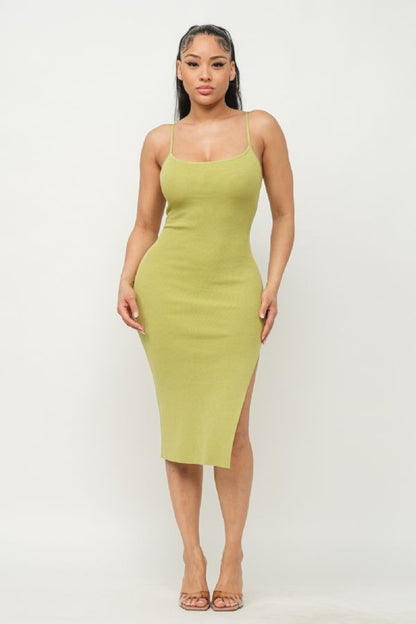 Woman wearing a green bean dress with a white background