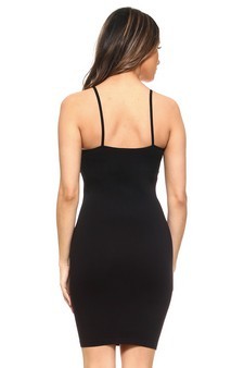 Black dress worn by a model on a white background