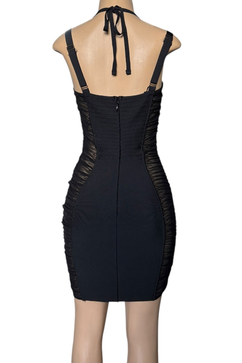 Black dress with straps on a white background