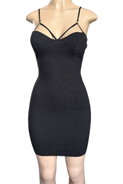 Black ribbed dress on a mannequin against a white background