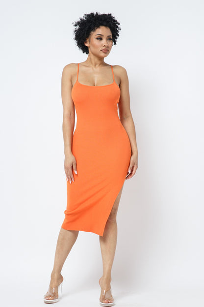 Woman wearing an orange dress with a white background