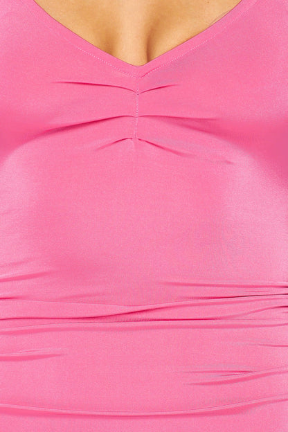 Close-up of a pink dress with a V-neckline