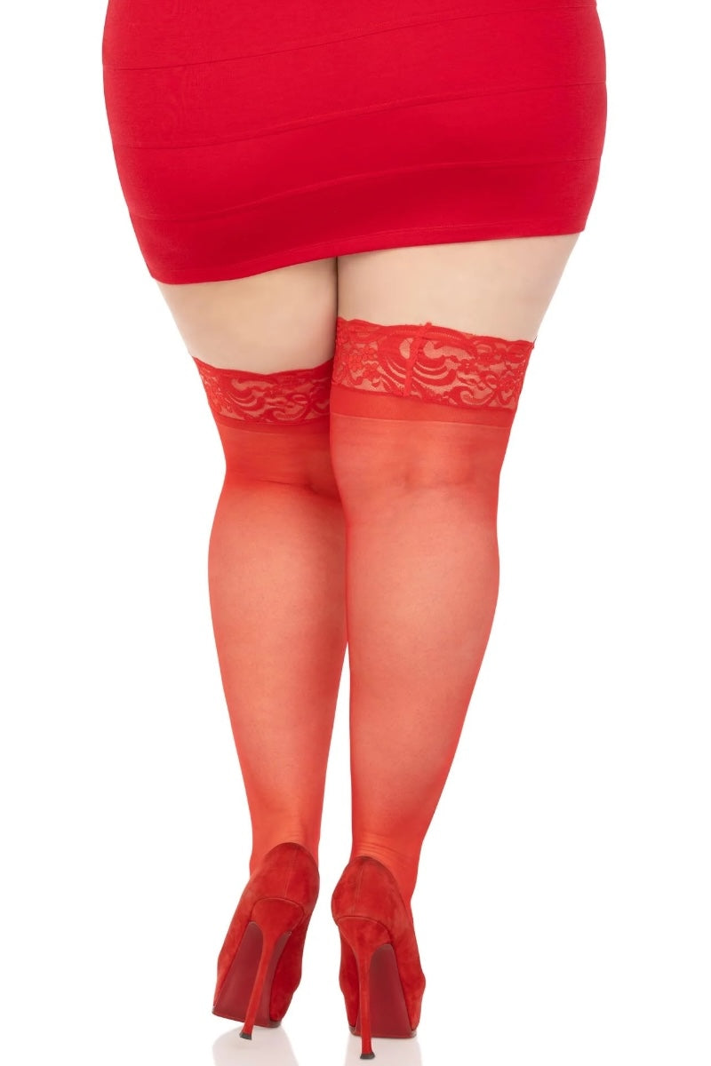 Red dress, red stockings, and red high-heeled shoes on a white background