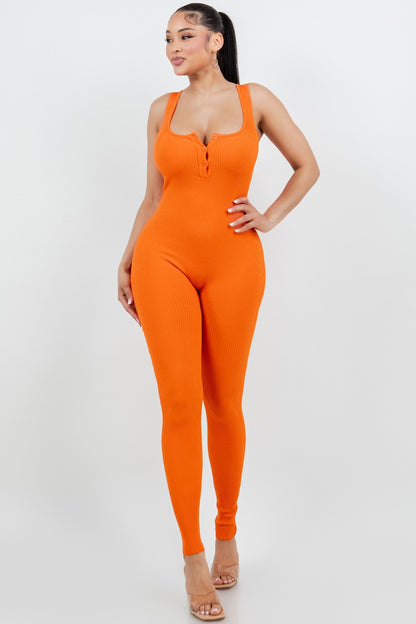 Woman wearing an orange jumpsuit on a white background