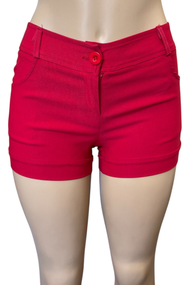Red shorts worn by a mannequin on a white background