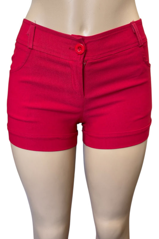 Red shorts worn by a mannequin on a white background