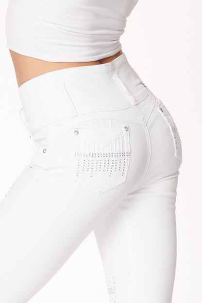 White jeans with embellishments on a white background