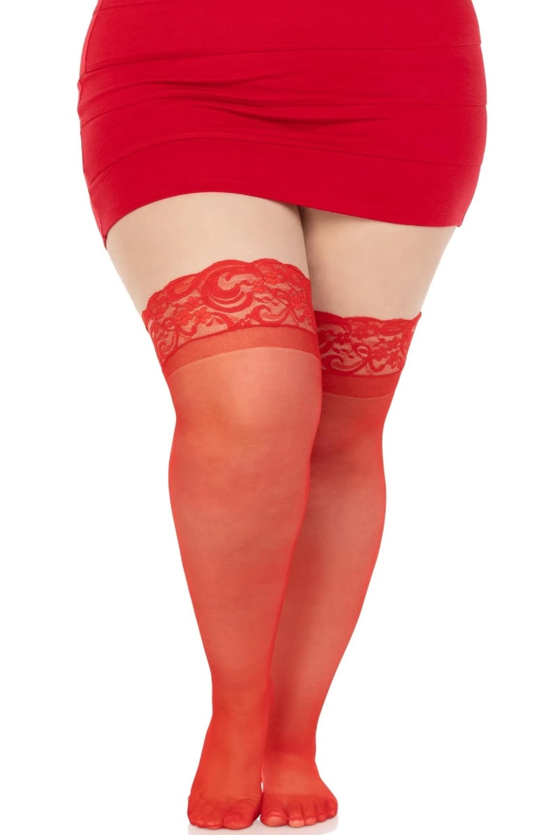 Red lace stockings worn with a red skirt on a white background