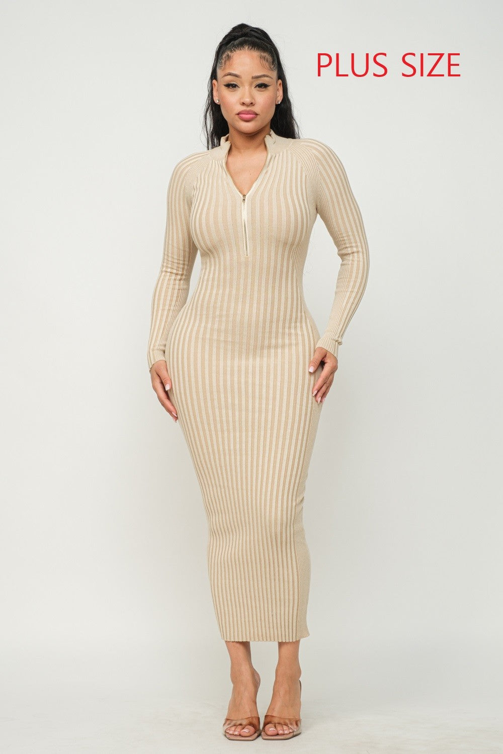 Woman wearing a cream ribbed dress on a white background with 'Plus Size' text.