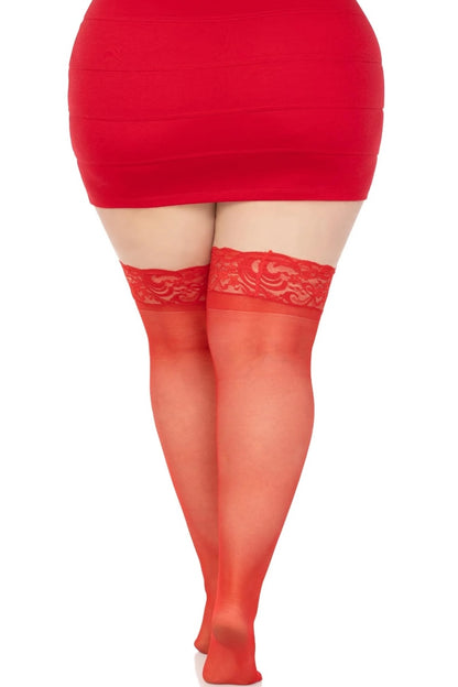 Red skirt and sheer red stockings with lace top on a white background