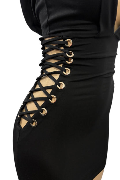Black lace-up dress with gold accents on a white background