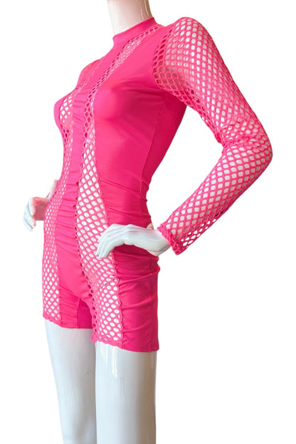 A bright pink one-piece romper with long sleeves and a high mock neck, featuring a fishnet mesh pattern on the sleeves and side panels, displayed on a white mannequin against a white background.