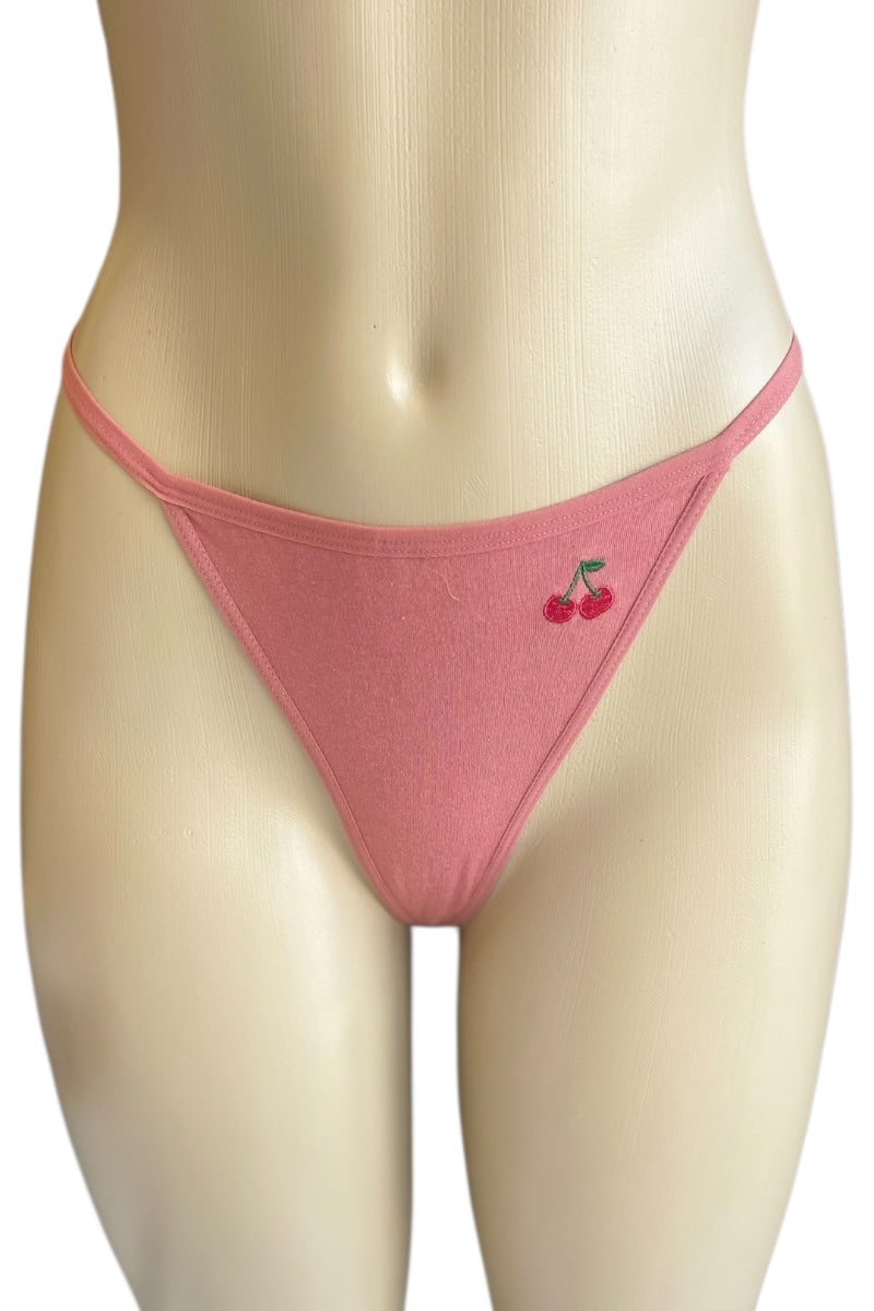 Pink thong with cherry detail on a mannequin against a white background