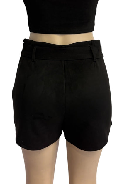 Black high-waisted shorts with a wide waistband and belt loops, shown on a mannequin torso against a white background.