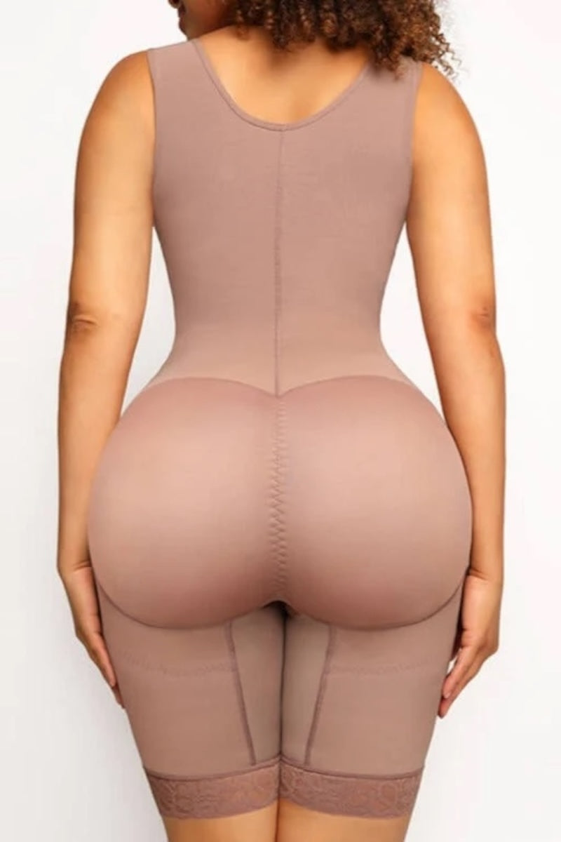 Person wearing a cocoa shapewear garment on a white background