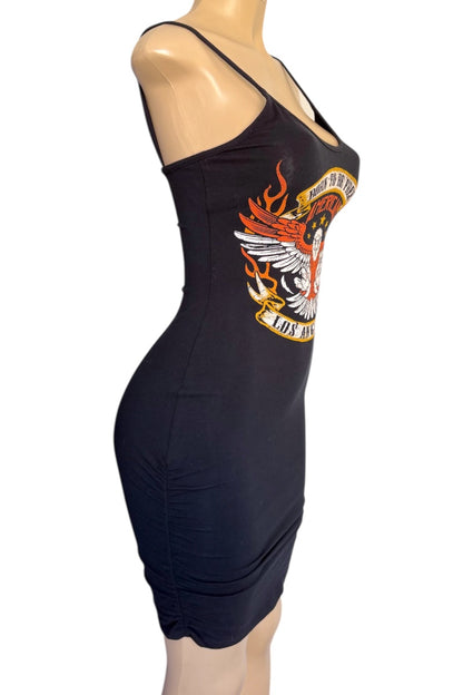 Black dress with a graphic design on a mannequin against a white background