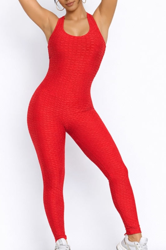 Red jumpsuit worn by a person on a white background