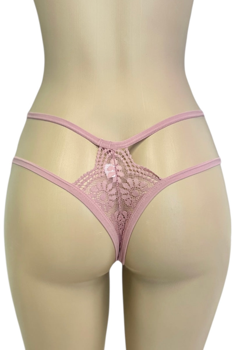 Pink lace thong on a mannequin against a white background