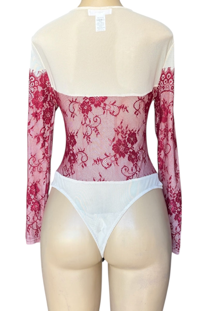 Mannequin wearing a burgundy floral lace long-sleeve top and cream mesh contrast on a white background