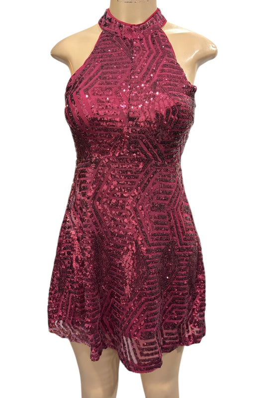 Burugndy sequin dress on a mannequin against a white background