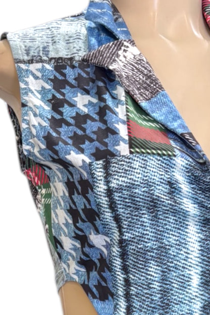 Mannequin wearing a patchwork top with various patterns and colors.