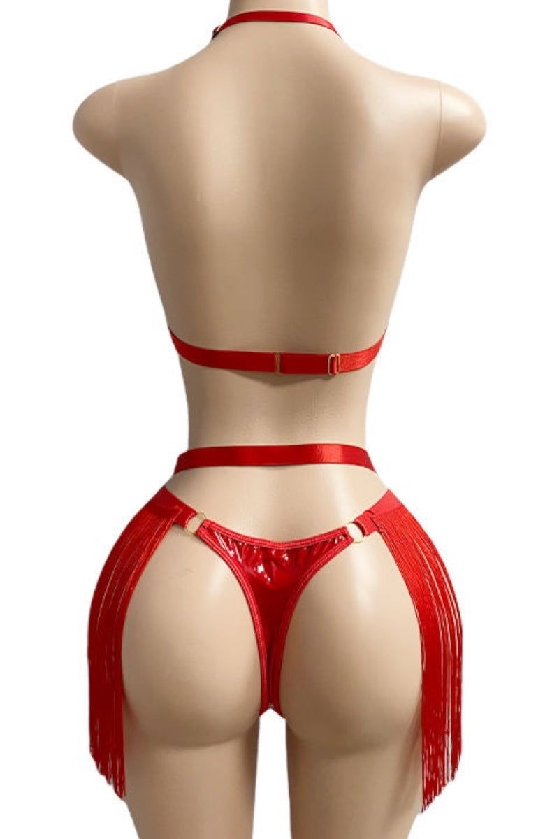 Red lingerie set on a mannequin against a white background