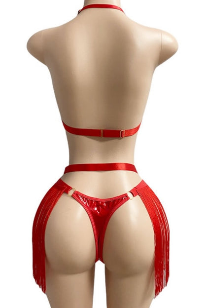 Red lingerie set on a mannequin against a white background