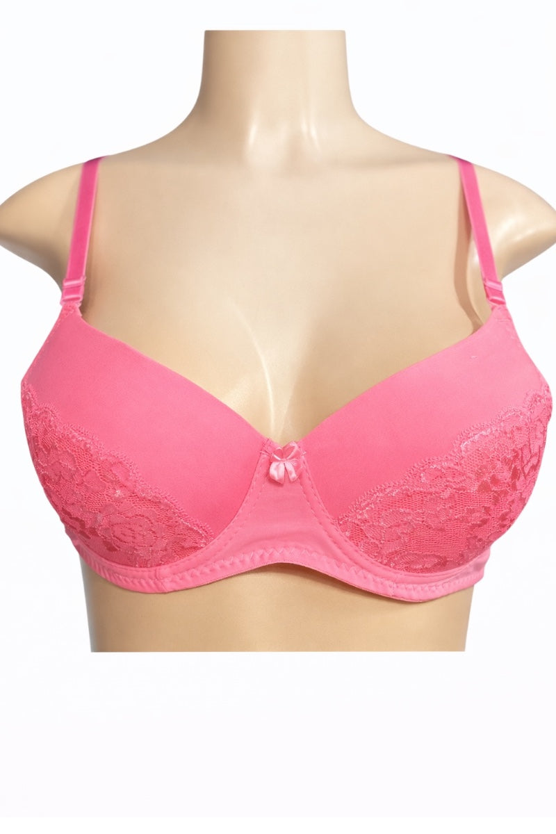 Pink bra on a mannequin against a white background