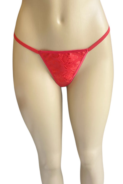Red thong on a mannequin against a white background