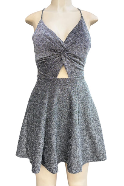 Silver glitter dress on a mannequin against a white background