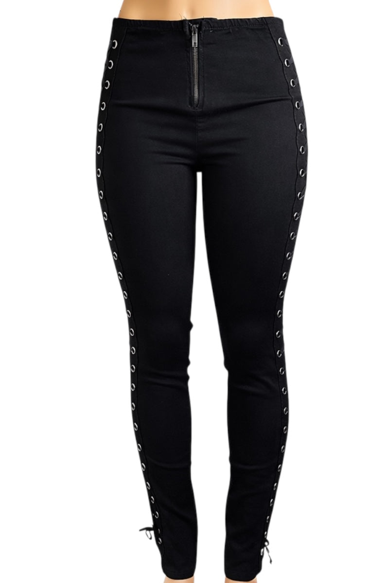 Black pants with eyelet details on a white background