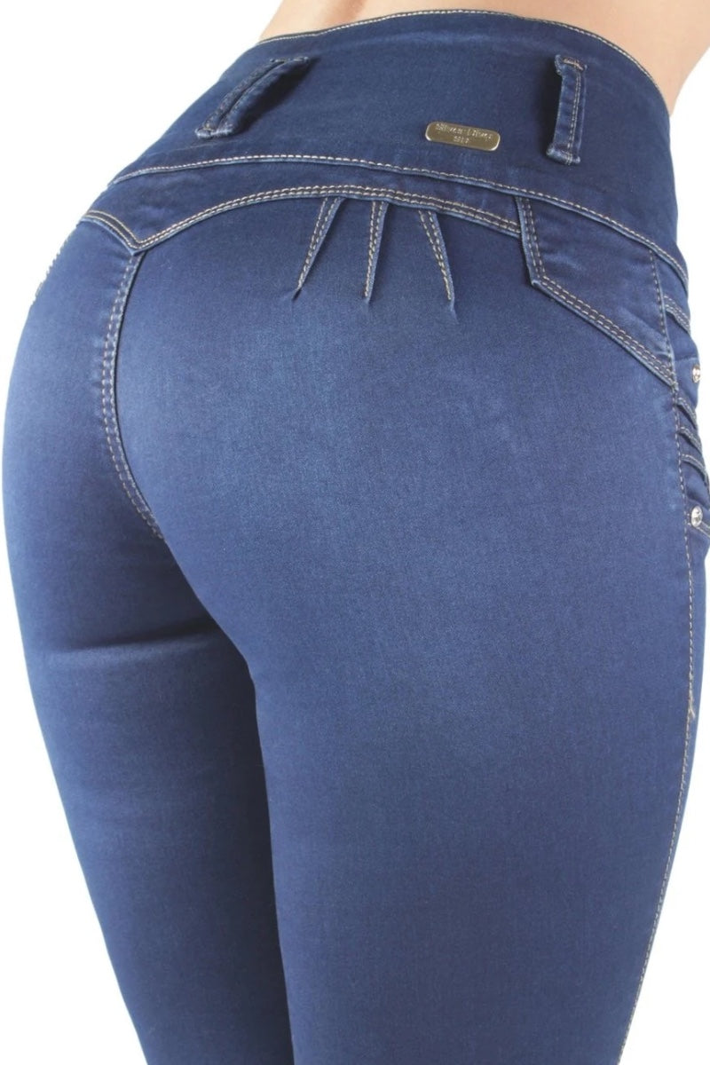 Blue jeans with a brand label on a white background