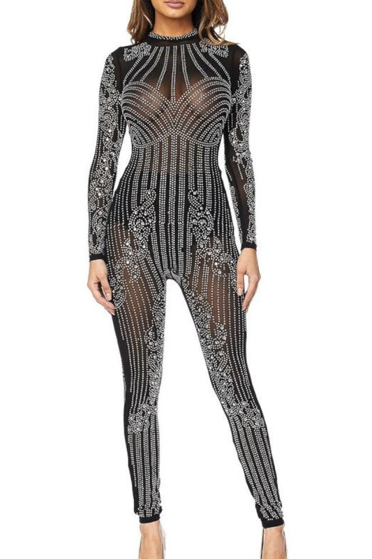 Black sheer jumpsuit with intricate silver embellishments on a white background
