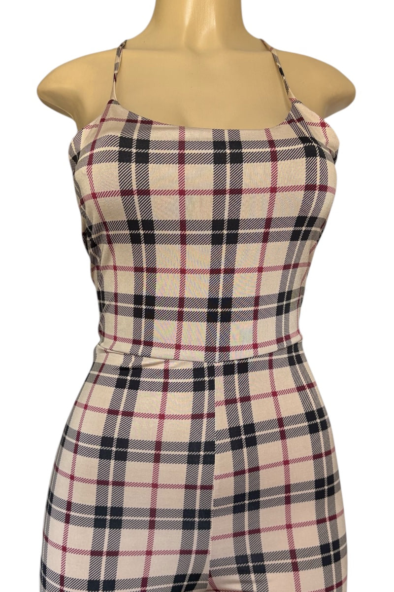 Plaid jumpsuit on a mannequin against a white background
